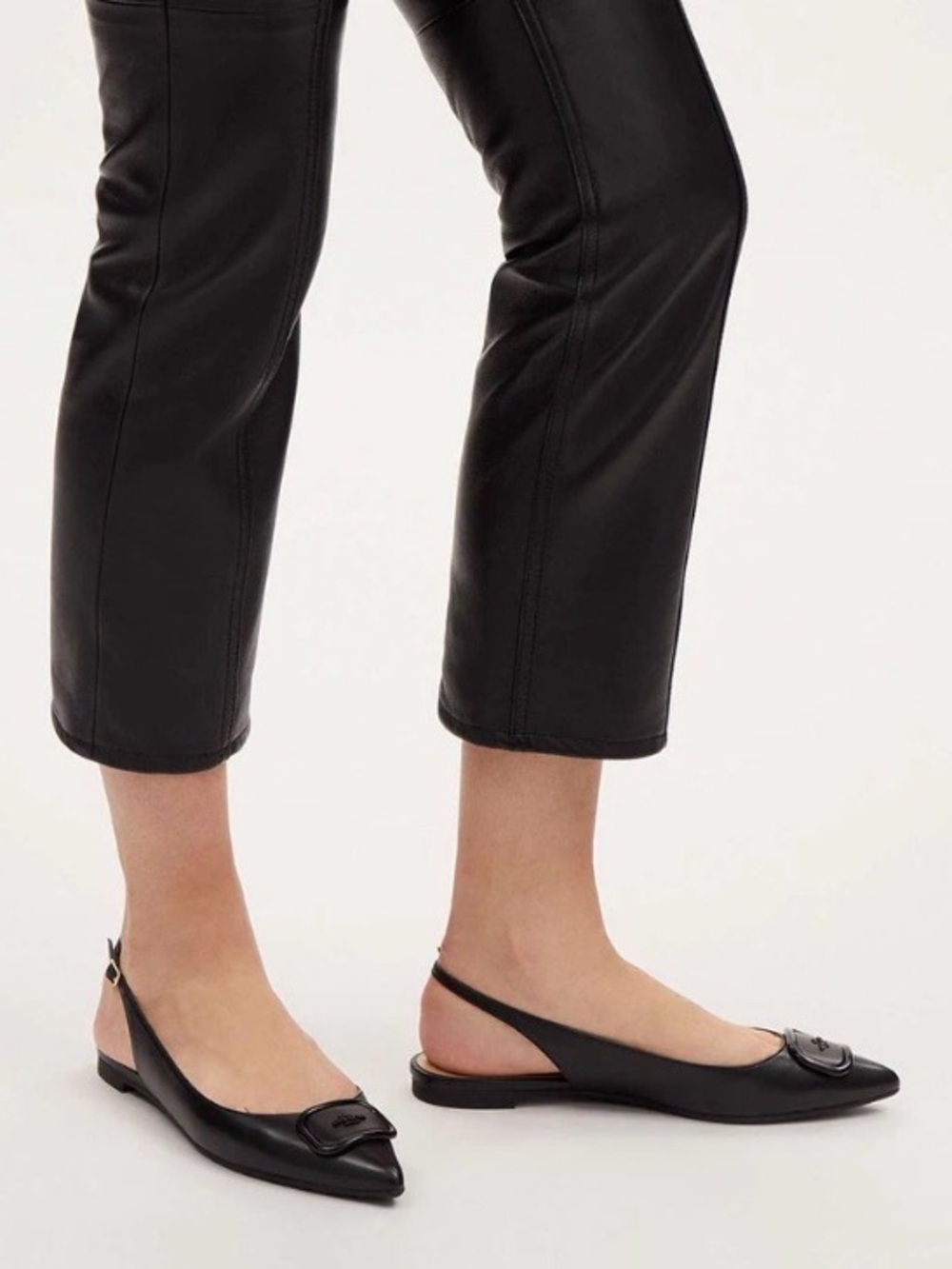 Coach Black Leather Pointed Toe Flats with Logo Plaque